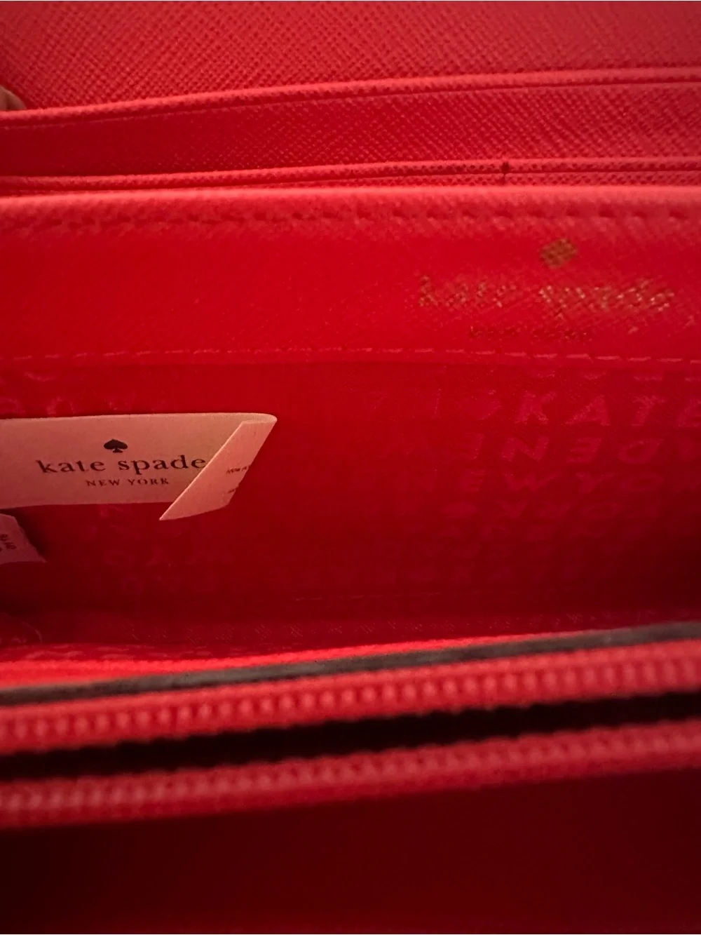 kate spade red saffiano continental wallet with gold plaque